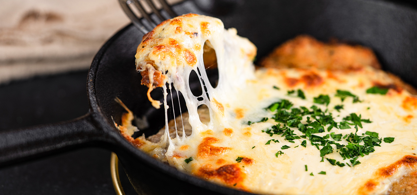 Milanesa de pollo a la suiza